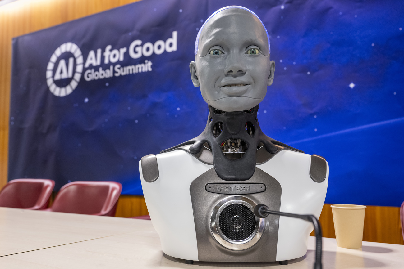 Ameca, one of the world's most lifelike humanoid robots (Engineered Arts), speaks during the World's first press conference with a panel of AI-enabled humanoid social robots as part of International Telecommunication Union (ITU) AI for Good Global Summit in Geneva, Switzerland, Friday, July 07, 2023. The ITU?s AI for Good Global Summit. Artificial intelligence (AI) and robotics innovators and their high-tech creations will join diplomats, industry executives, academics, policy-makers, and UN partners in Geneva, Switzerland, 6-7 July, for ITU?s AI for Good Global Summit, in Geneva, Switzerland, Friday, July 07, 2023. (KEYSTONE/Martial Trezzini)